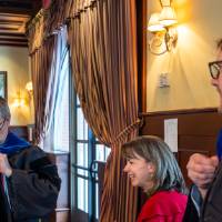 Faculty getting ready and talking